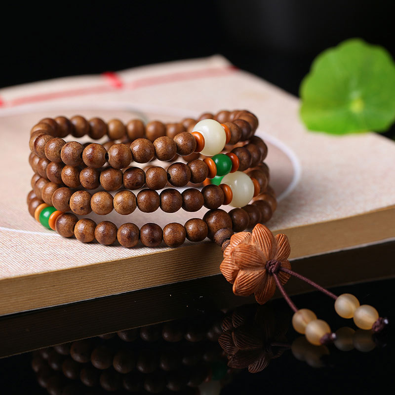 Buddha Stones 108 Mala Beads Legno di Pesca Bodhi Seed Lotus Preghiera Meditazione Bracciale