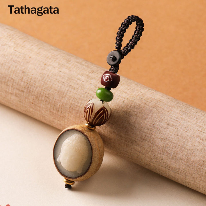 Portachiavi con decorazione Buddha Stones semi di Bodhi