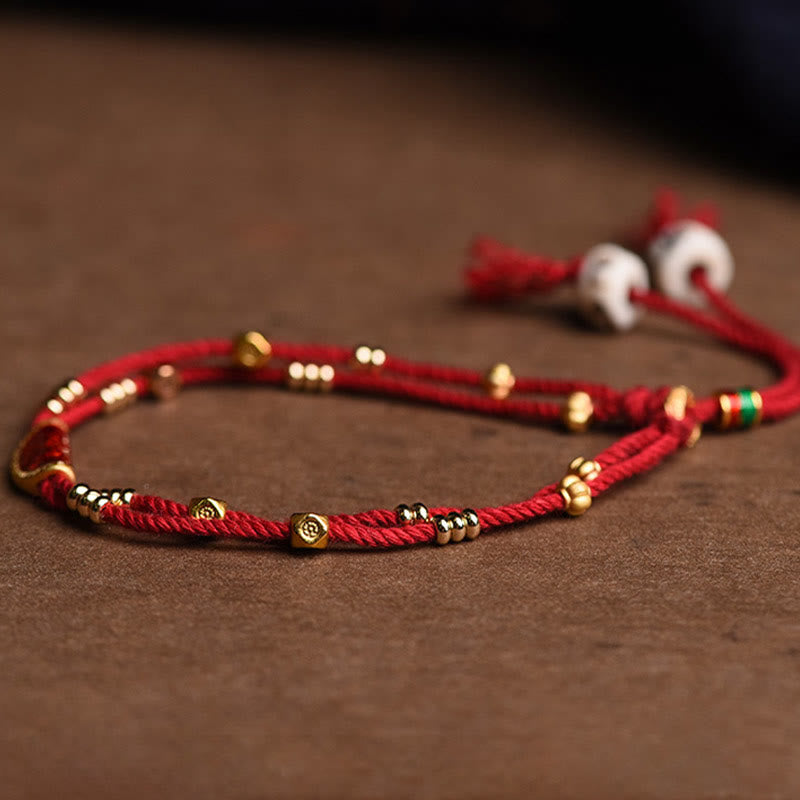 Braccialetto di corda rossa intrecciata con design di gnocchi di cinabro fatti a mano Buddha Stones