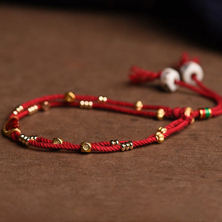 Braccialetto di corda rossa intrecciata con design di gnocchi di cinabro fatti a mano Buddha Stones