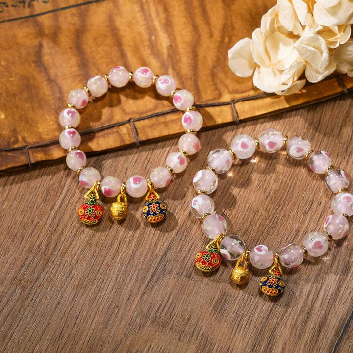 Buddha Stones Oro Deglutizione Bestia Famiglia Ciondolo Luminoso Rosa Cuore Amore Fluorescente Liuli Perline di Vetro Braccialetto Benedizioni