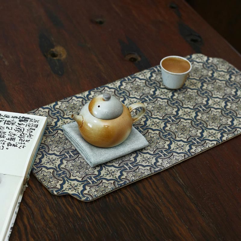 Elegante sottobicchiere per tazza da tè con motivo broccato floreale