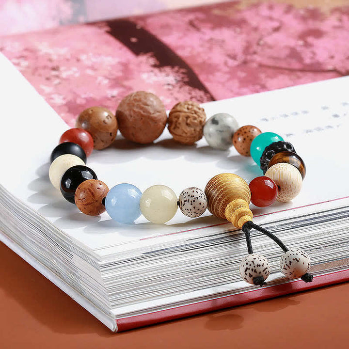 Bracciale Mala da polso Buddha Stones, semi di Bodhi, agata, saggezza e armonia