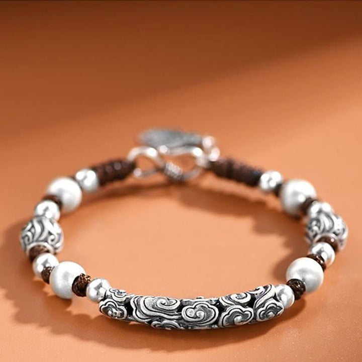 Braccialetto di corda di ricchezza con nuvola di buon auspicio in argento sterling 999 fatto a mano in rame Buddha Stones in Tibet