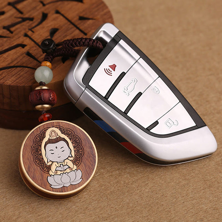 Buddha Stones Legno di ebano Palissandro Buddha Avalokitesvara Om Mani Padme Hum Equilibrio Decorazione della catena chiave dell'auto