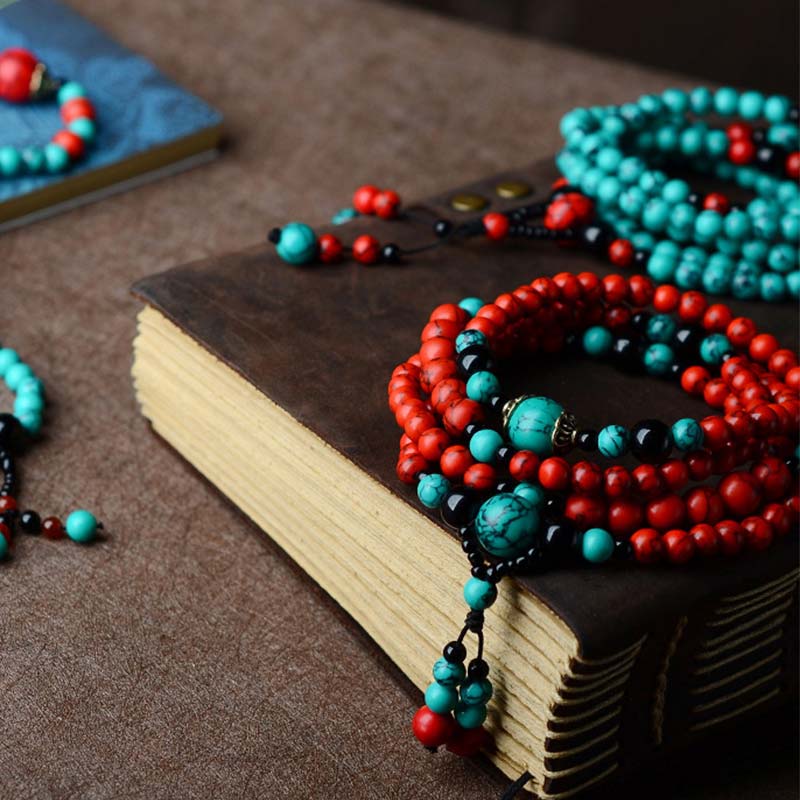 Braccialetto di protezione con perline di turchese rosso e onice nero Buddha Stones