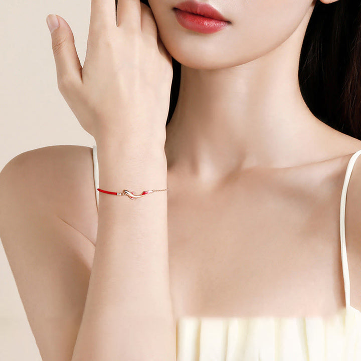 Braccialetto in corda rossa intrecciata con stella di loto e pesce koi in argento sterling 925 Buddha Stones
