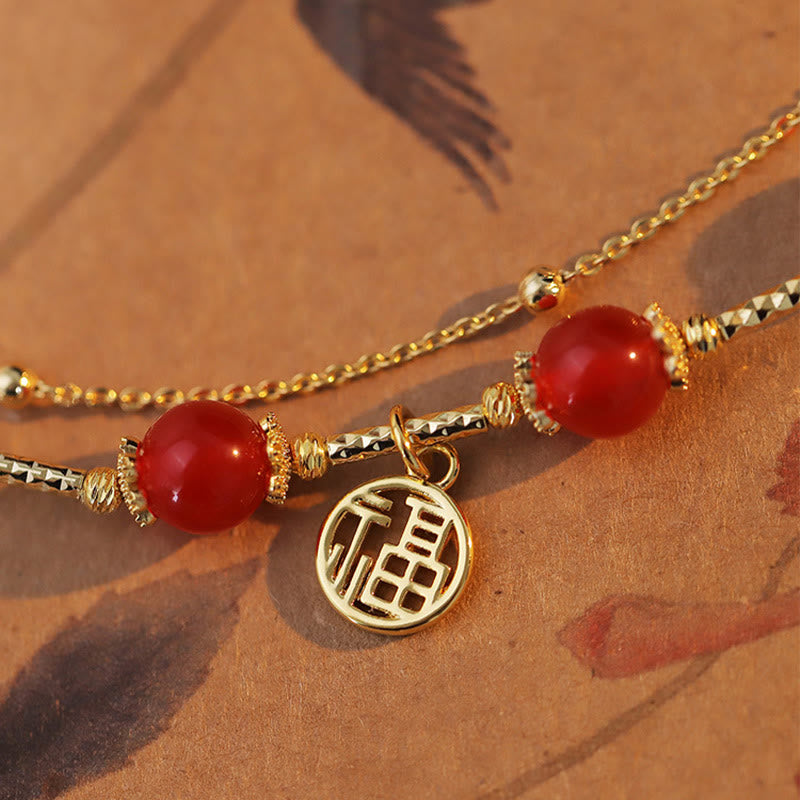 Braccialetto di accettazione di sé con ciondolo a forma di carattere Fu in agata rossa Buddha Stones
