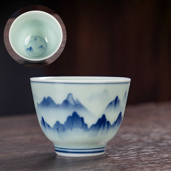 Buddha Stones Paesaggio blu Montagne Loto Gatto carino Padiglioni Magnolia Canna Aironi Tazza da tè in ceramica Piccola tazza da tè Kung Fu