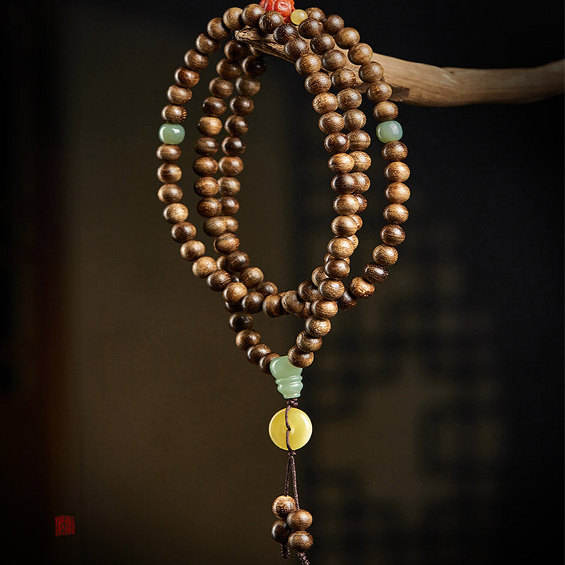 Buddha Stones 108 perle di Mala Kalimantan Agarwood Zucca Giada Ambra Bracciale equilibrio