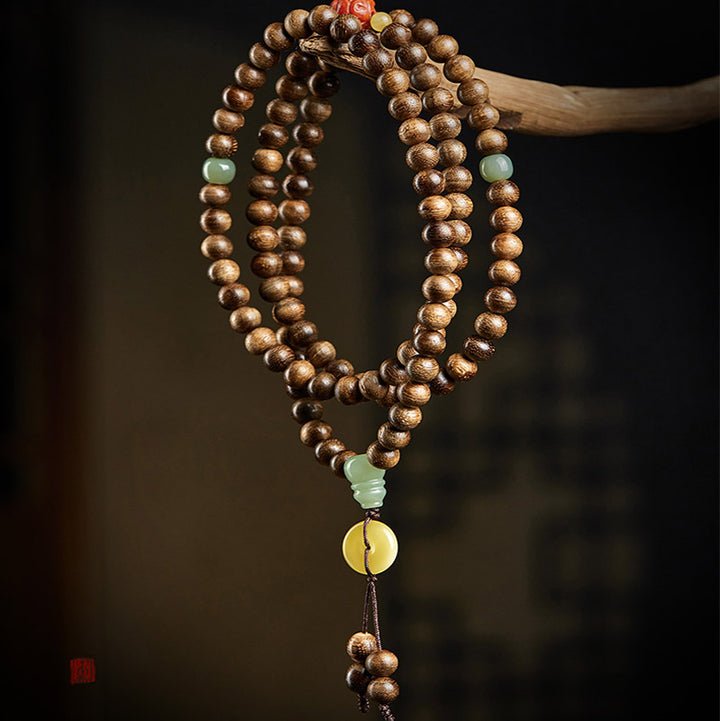 Buddha Stones 108 perle di Mala Kalimantan Agarwood Zucca Giada Ambra Bracciale equilibrio