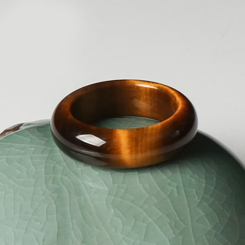 Anello di protezione della forza della pietra dell'occhio di tigre Buddha Stones