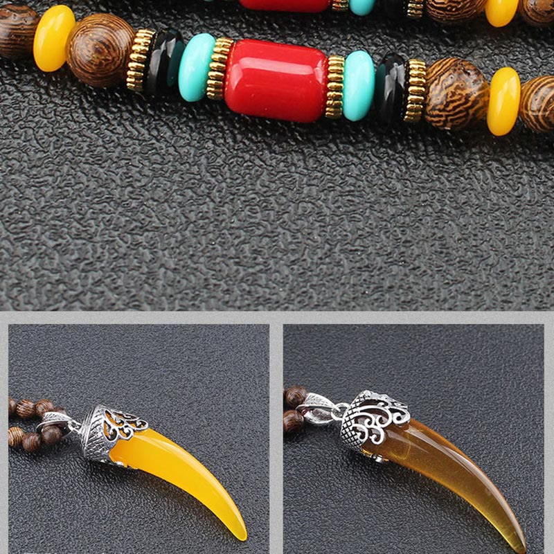 Collana con ciondolo in stile corno in pietra turchese e legno wenge, protezione e meditazione