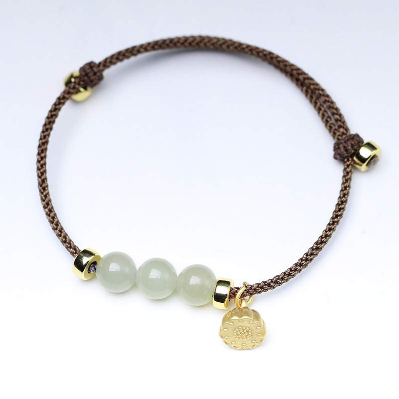 Braccialetto intrecciato con corda rossa in semi di loto di giada naturale Buddha Stones