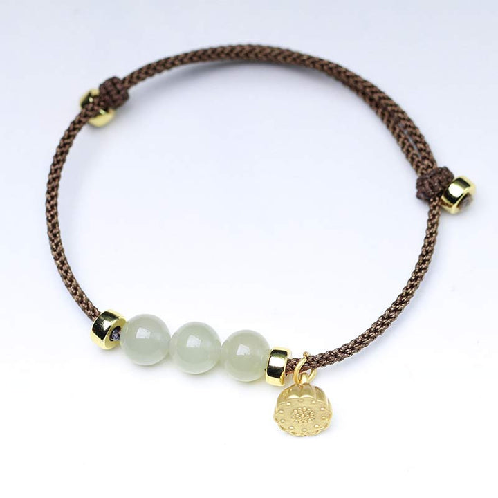 Braccialetto intrecciato con corda rossa in semi di loto di giada naturale Buddha Stones