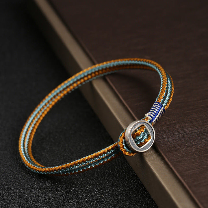 Braccialetto con cordino intrecciato di protezione con bottone fatto a mano in argento sterling 925 Buddha Stones