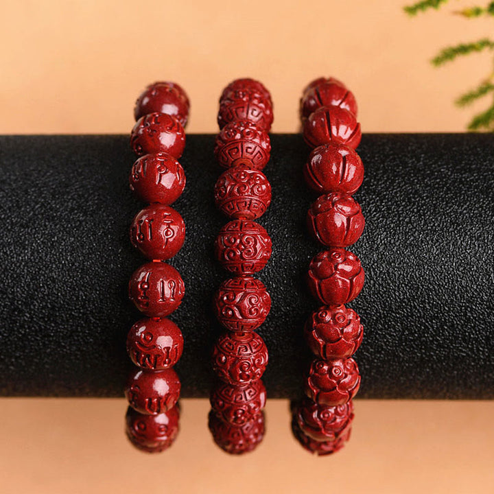 Braccialetto di benedizione del loto con motivo a fregi in cinabro naturale Om Mani Padme Hum Buddha Stones