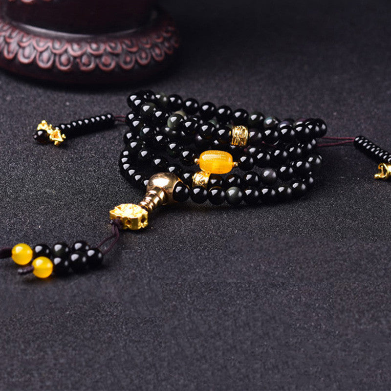 Braccialetto Mala Buddha Stones 108 perle in ossidiana nera naturale Lotus Fulfilment