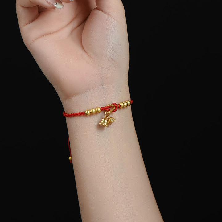 Bracciale intrecciato con ciondolo a forma di fiore di mughetto fatto a mano con Buddha Stones e protezione dalla fortuna