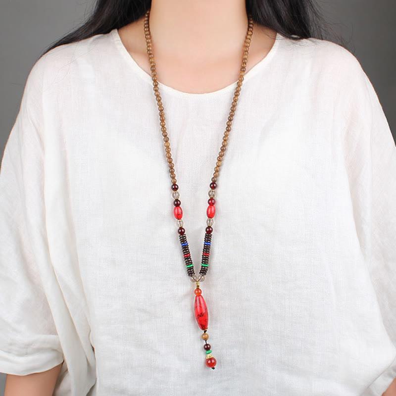 Collana con ciondolo in pietra turchese, pietra di legno di wenge, protezione e calma Buddha Stones