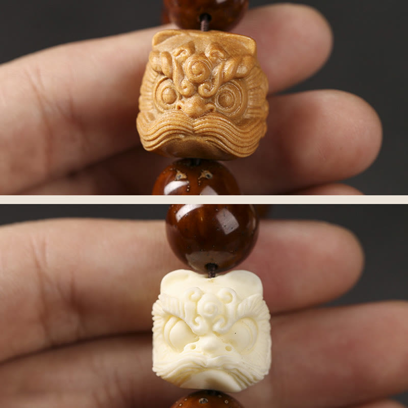 Braccialetto della saggezza del leone danzante dei semi di Bodhi viola Buddha Stones