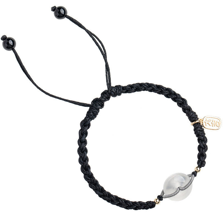 Braccialetto con corda positiva con fibbia rotonda in calcedonio Buddha Stones