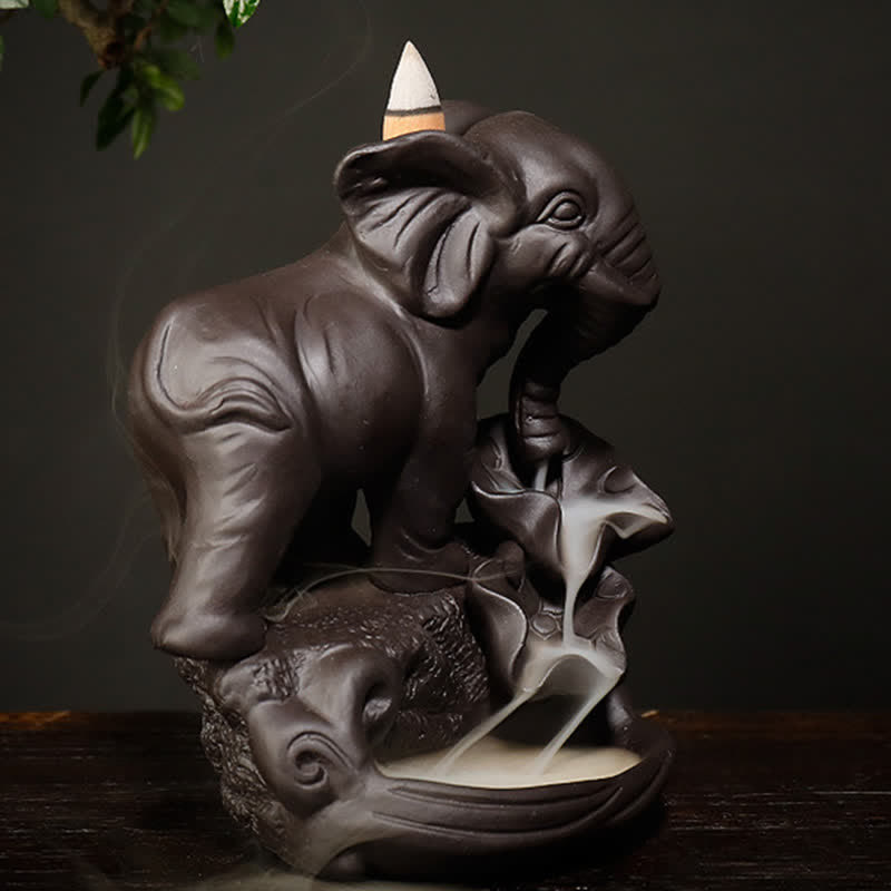 Decorazione bruciatore di incenso di guarigione della pace con fontana di fumo a riflusso in argilla viola elefante tibetano