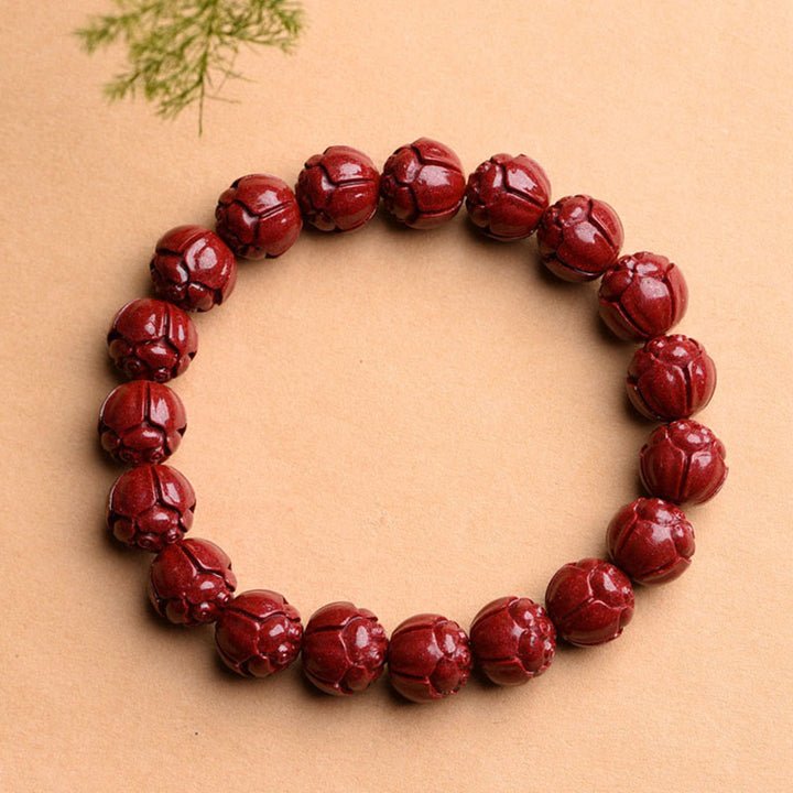 Braccialetto di benedizione del loto con motivo a fregi in cinabro naturale Om Mani Padme Hum Buddha Stones