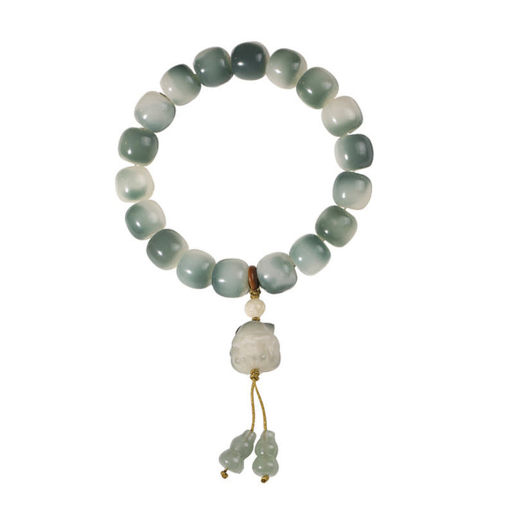 Bracciale della pace Buddha Stones, semi di Bodhi sfumati, volpe a nove code, zampa di gatto, artiglio di pigna - image 11