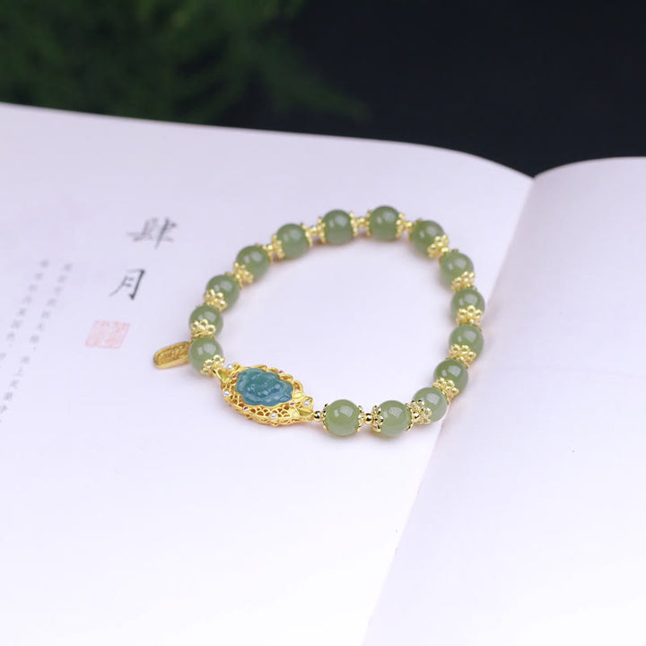 Braccialetto portafortuna in giada Hetian Lotus in argento sterling 925 placcato oro 14K