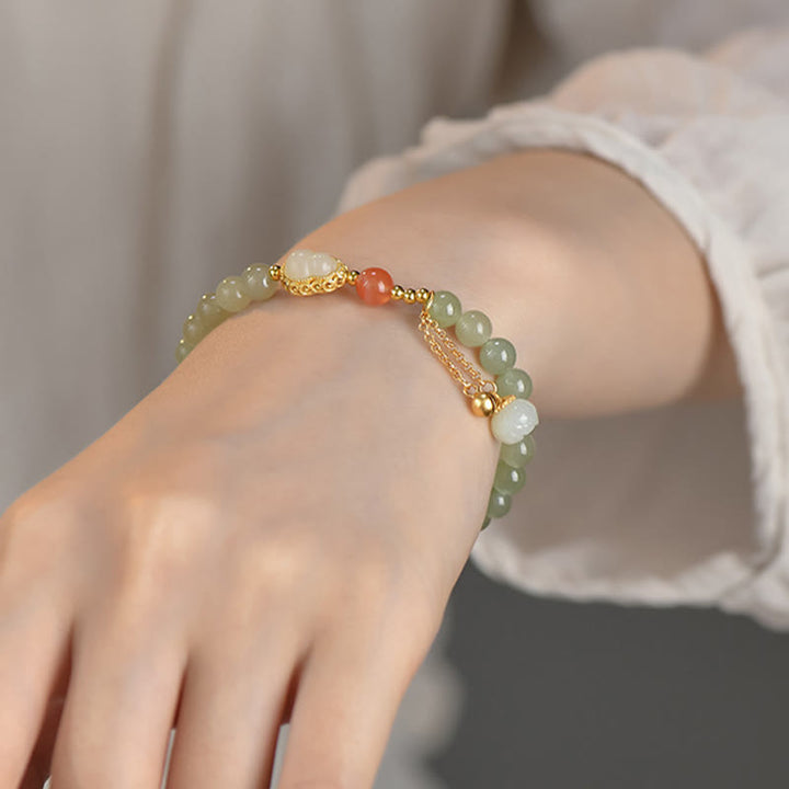 Braccialetto portafortuna in argento sterling 925 con giada Hetian e zucca di loto