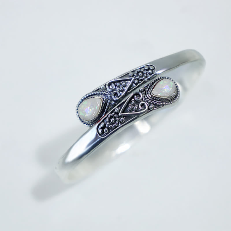 Braccialetto con polsino curativo con motivo a goccia d'acqua in zircone Buddha Stones