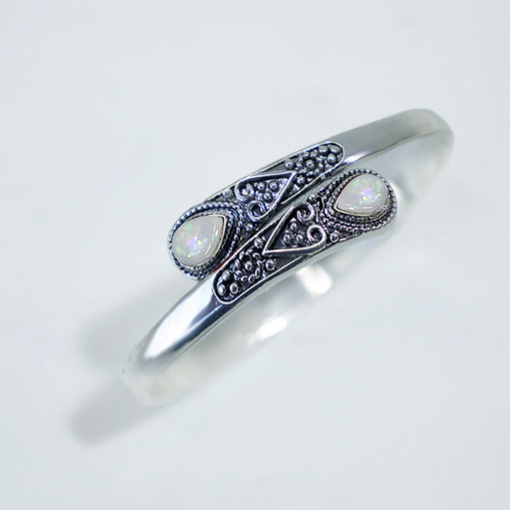 Braccialetto con polsino curativo con motivo a goccia d'acqua in zircone Buddha Stones
