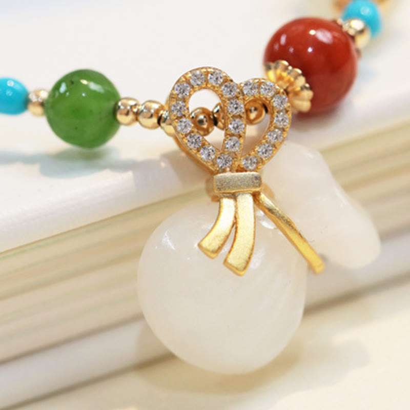 Braccialetto di benedizione con sacco di soldi placcato oro 14K in giada bianca naturale di Hetian Buddha Stones