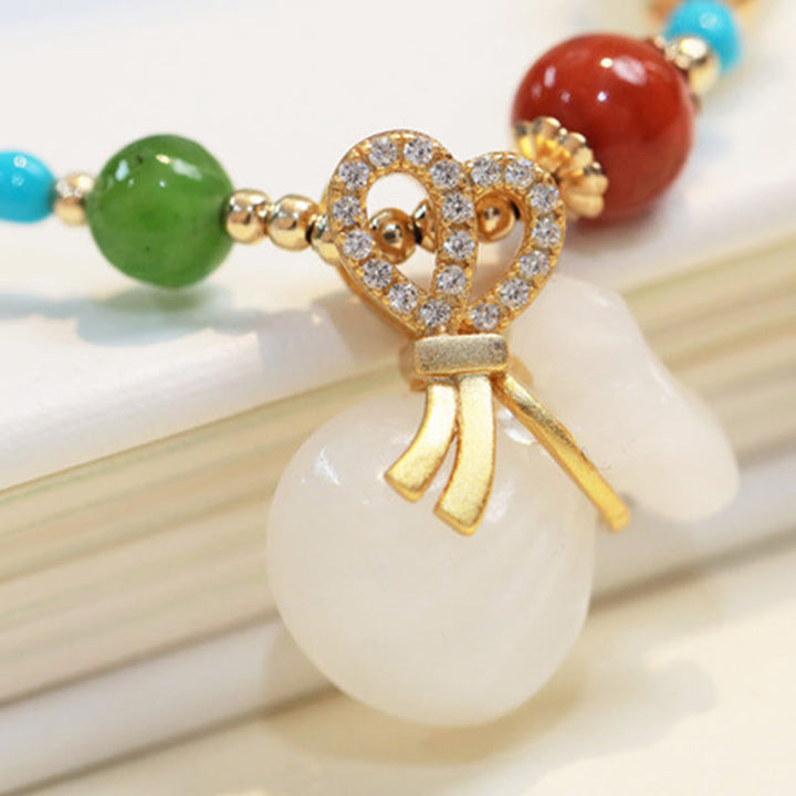 Braccialetto di benedizione con sacco di soldi placcato oro 14K in giada bianca naturale di Hetian Buddha Stones