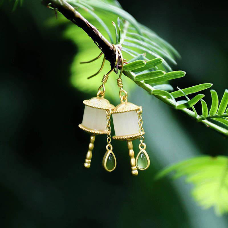 Orecchini pendenti con ruota della preghiera in giada e argento sterling 925 Buddha Stones