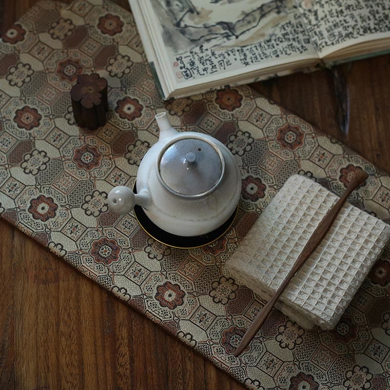 Elegante sottobicchiere per tazza da tè con motivo broccato floreale