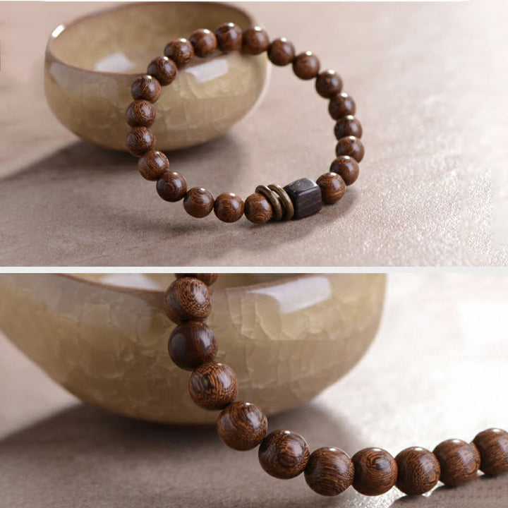 Braccialetto spirituale in legno di Buddha Stones Phoebe Zhennan