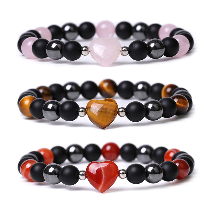 Braccialetto di protezione del cuore dell'amore di cristallo della pietra dell'occhio di tigre di onice nero Buddha Stones