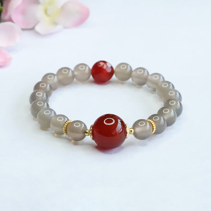Braccialetto dell'armonia in agata rossa e calcedonio grigio naturale Buddha Stones