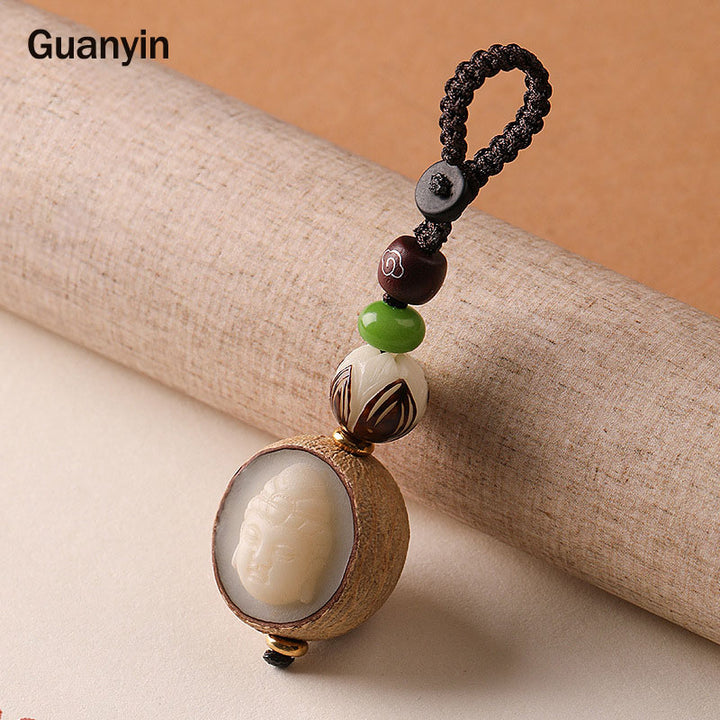 Portachiavi con decorazione Buddha Stones semi di Bodhi