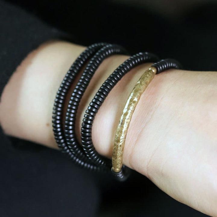 Bracciale multistrato in legno di ebano e rame Buddha Stones Balance