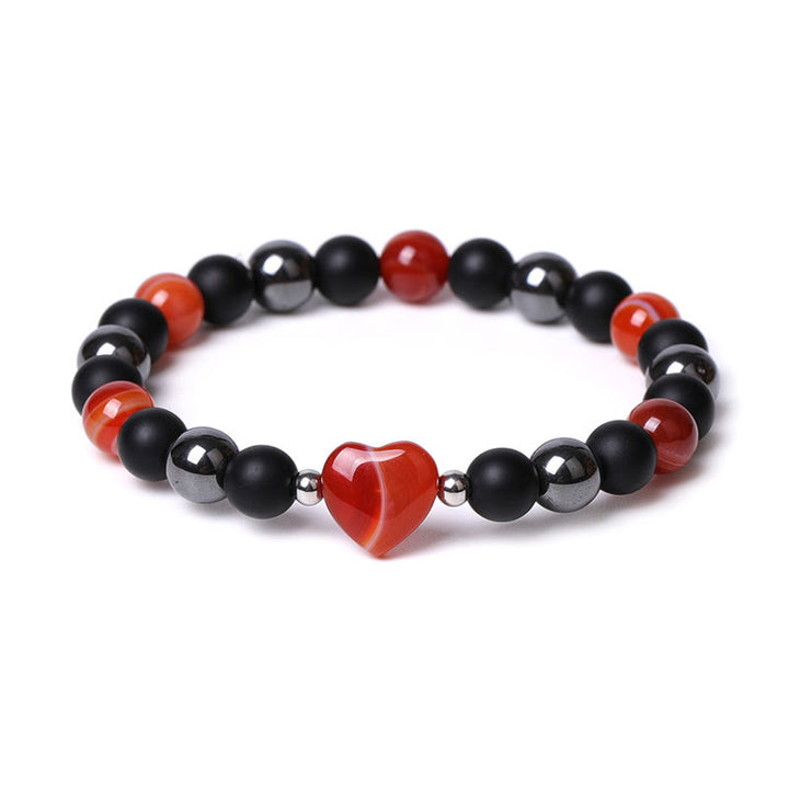 Braccialetto di protezione del cuore dell'amore di cristallo della pietra dell'occhio di tigre di onice nero Buddha Stones