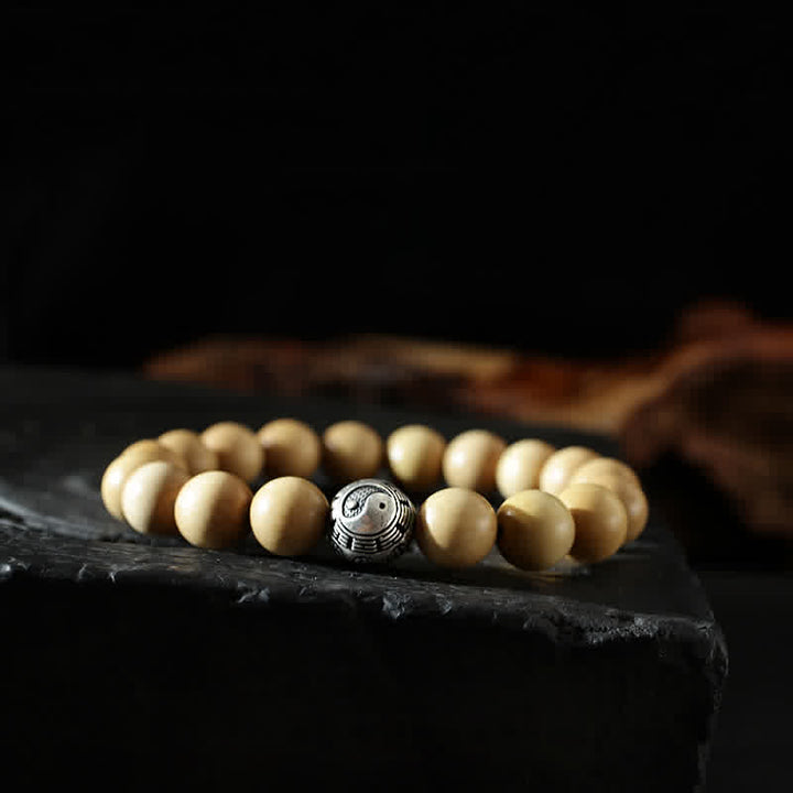Bracciale di ricchezza e fortuna di legno di pesca del Tibet, loto, cinabro, Bagua Yin Yang