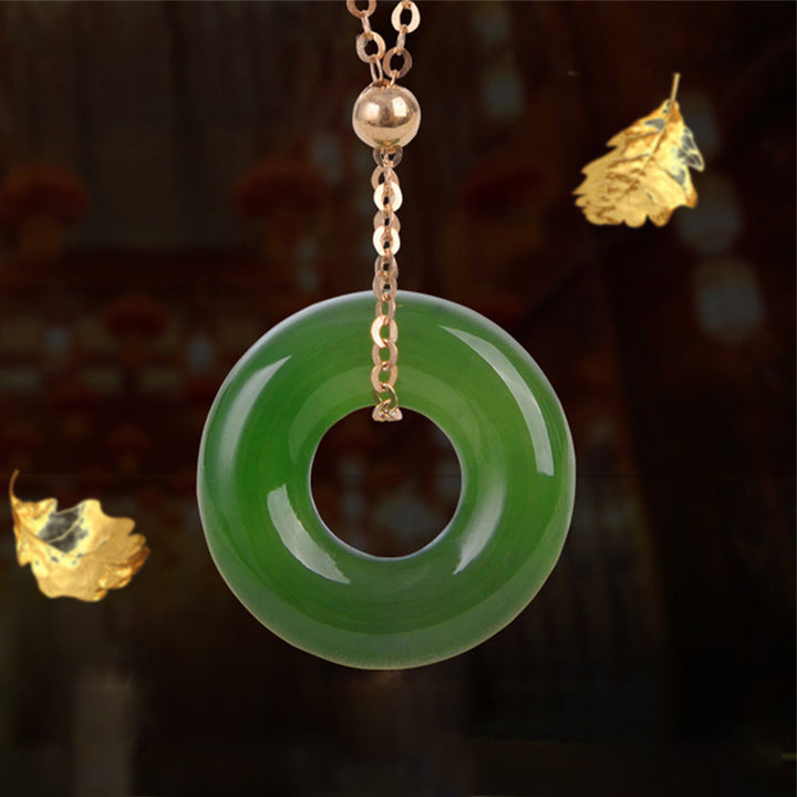 Collana con ciondolo in oro 14K con giada ciano rotonda e guarigione