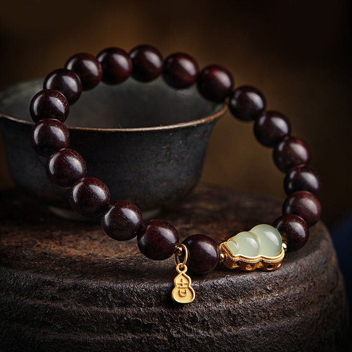 Braccialetto di rilassamento calmo con piccole foglie di sandalo rosso, zucca e giada Buddha Stones