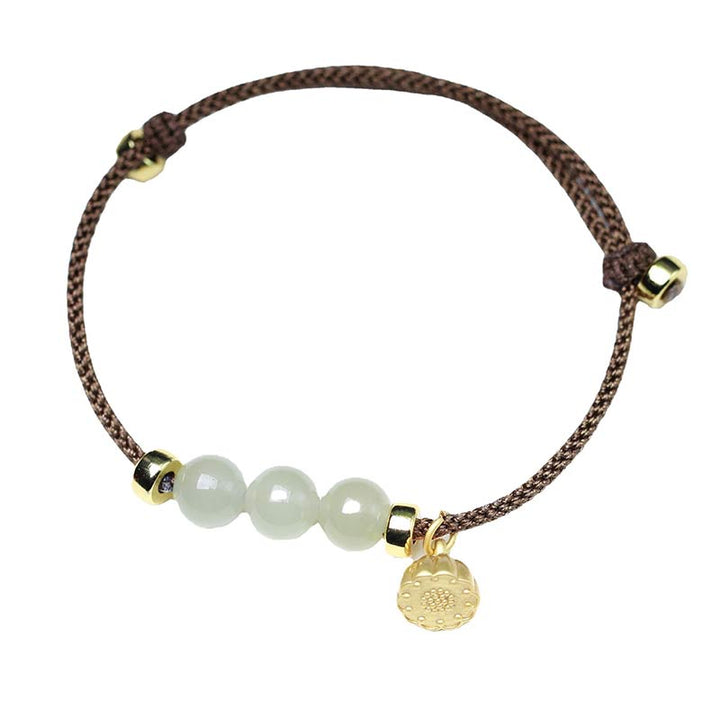 Braccialetto intrecciato con corda rossa in semi di loto di giada naturale Buddha Stones