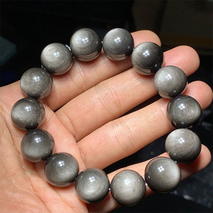 Braccialetto di protezione lenitiva in ossidiana lucida d'argento naturale Buddha Stones
