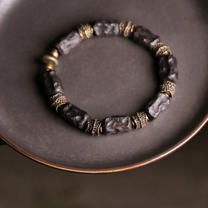 Braccialetto Buddha Stones Tibetano Ebano Legno Rame Calma Pace