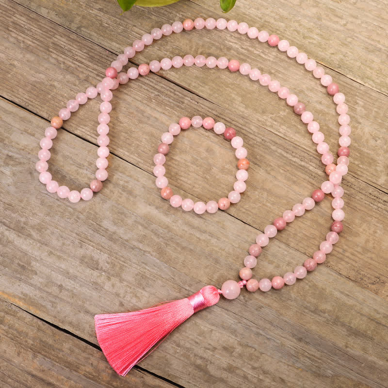 Braccialetto con nappa di cristallo rosa e 108 perle di Mala Buddha Stones